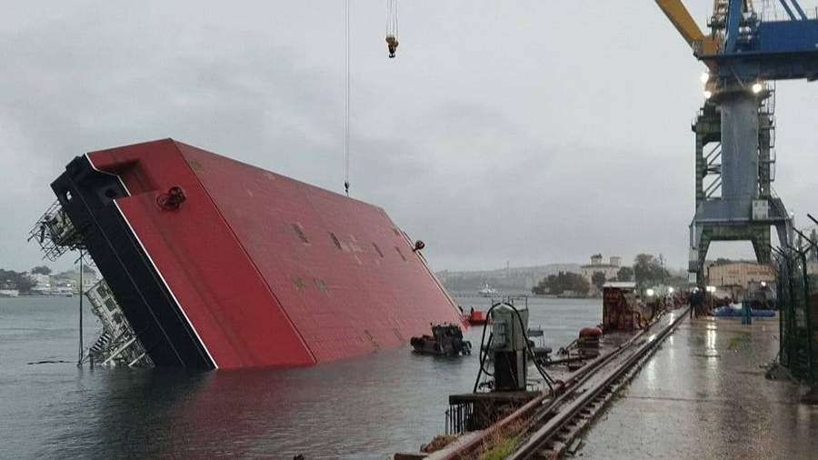 Damaged floating crane Gregory Prosyankin lying on its side in Yuzhnaya Bay, Sevastopol