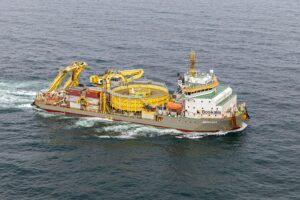 Boskalis Ndurance installing inter-array cables for a French offshore wind farm after loading cables in Greece